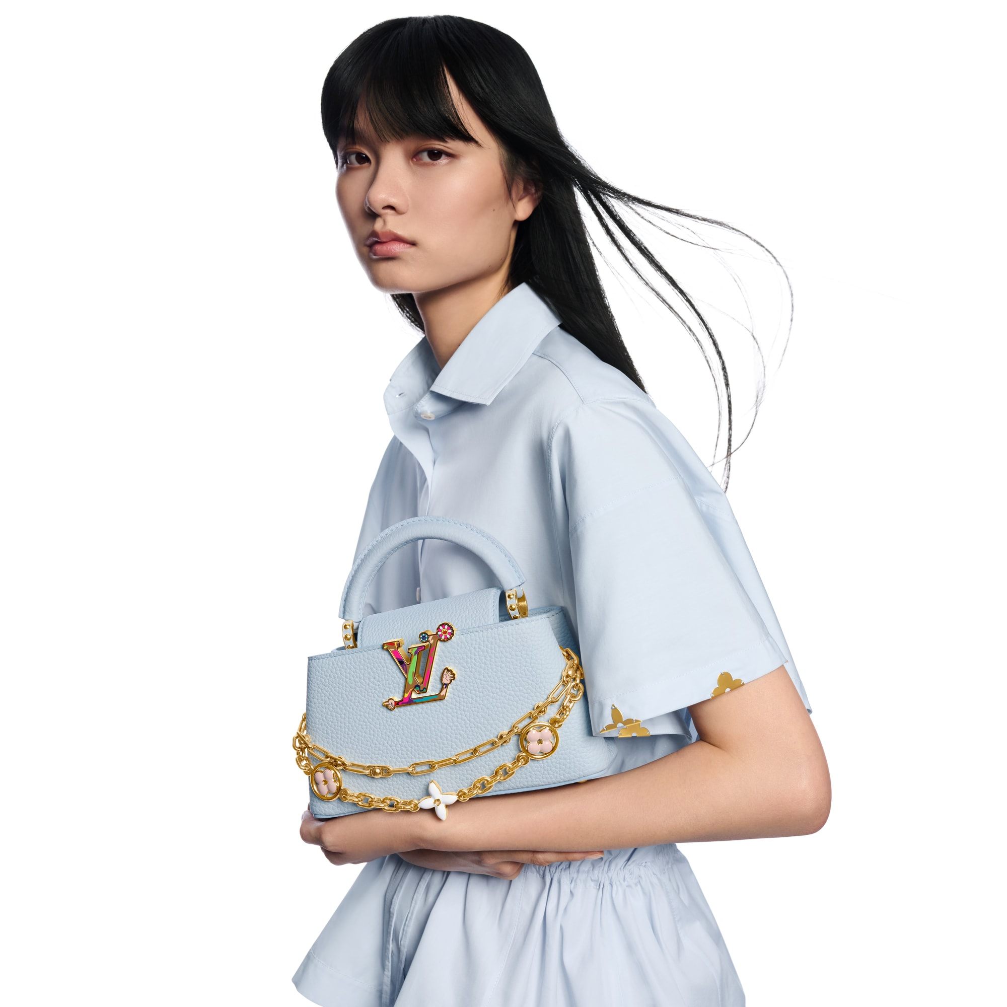 01_Louis_Vuitton_Capucines_East_West_M13707_Olympe_Blue_worn_full.jpg